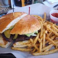 Andele's Dog House signature dishes Chile Con Queso SteakSteak and EnchiladaGreen Chile Cheese Steak